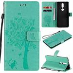 For Nokia 2.4 Tree & Cat Pattern Pressed Printing Horizontal Flip PU Leather Case with Holder & Card Slots & Wallet & Lanyard(Green)