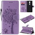 For Nokia 2.4 Tree & Cat Pattern Pressed Printing Horizontal Flip PU Leather Case with Holder & Card Slots & Wallet & Lanyard(Light Purple)