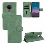 For Nokia 5.4 Solid Color Skin Feel Magnetic Buckle Horizontal Flip Calf Texture PU Leather Case with Holder & Card Slots & Wallet(Green)