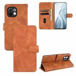 For Xiaomi Mi 11 Solid Color Skin Feel Magnetic Buckle Horizontal Flip Calf Texture PU Leather Case with Holder & Card Slots & Wallet(Brown)