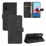 For Xiaomi Redmi Note 10 Solid Color Skin Feel Magnetic Buckle Horizontal Flip Calf Texture PU Leather Case with Holder & Card Slots & Wallet(Black)