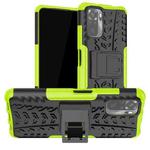 For Xiaomi Redmi Note 10 Tire Texture Shockproof TPU+PC Protective Case with Holder(Green)