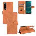 For Sony Xperia 5 III Solid Color Skin Feel Magnetic Buckle Horizontal Flip Calf Texture PU Leather Case with Holder & Card Slots & Wallet(Brown)