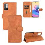 For Xiaomi Redmi Note 10 5G Solid Color Skin Feel Magnetic Buckle Horizontal Flip Calf Texture PU Leather Case with Holder & Card Slots & Wallet(Brown)