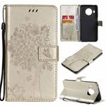 For Nokia X20 Tree & Cat Pattern Pressed Printing Horizontal Flip PU Leather Case with Holder & Card Slots & Wallet & Lanyard(Gold)