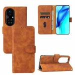 For Huawei P50 Solid Color Skin Feel Magnetic Buckle Horizontal Flip Calf Texture PU Leather Case with Holder & Card Slots & Wallet(Brown)