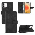 For iPhone 13 Solid Color Skin Feel Magnetic Buckle Horizontal Flip Calf Texture PU Leather Case with Holder & Card Slots & Wallet(Black)