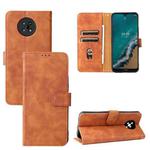 For Nokia G50 Solid Color Skin Feel Magnetic Buckle Horizontal Flip Calf Texture PU Phone Case(Brown)