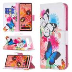For Google Pixel 6 Colored Drawing Pattern Horizontal Flip Phone Leather Case with Holder & Card Slots & Wallet(Butterflies)