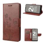 For Nokia G21 Butterfly Flower Pattern Leather Phone Case(Brown)