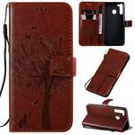 For Galaxy A21 Tree & Cat Pattern Pressed Printing Horizontal Flip PU Leather Case with Holder & Card Slots & Wallet & Lanyard(Brown)