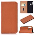 For Huawei P20 Lite(2019) Solid Color Frosted Magnetic Horizontal Flip Leather Case with Card Slots & Holder(Brown)