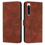For Sony Xperia 5 IV Skin Feel Heart Embossed Leather Phone Case(Brown)