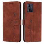 For Motorola Moto E13 Skin Feel Heart Embossed Leather Phone Case(Brown)