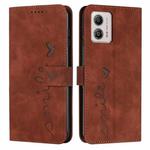 For Motorola Moto G73 Skin Feel Heart Embossed Leather Phone Case(Brown)