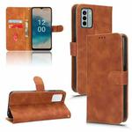 For Nokia G22 Skin Feel Magnetic Flip Leather Phone Case(Brown)