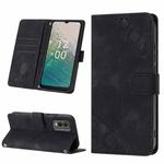For Nokia C32 Skin-feel Embossed Leather Phone Case(Black)