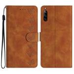 For Sony Xperia L4 Seven Butterflies Embossed Leather Phone Case(Brown)