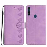 For Motorola Moto E 2020 Seven Butterflies Embossed Leather Phone Case(Purple)