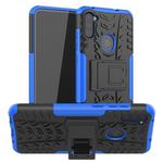 For Samsung Galaxy M11 Tire Texture Shockproof TPU+PC Protective Case，with Holder(Blue)