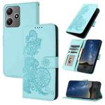 For Xiaomi Redmi 12 Datura Flower Embossed Flip Leather Phone Case(Light blue)