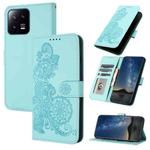 For Xiaomi 13 Datura Flower Embossed Flip Leather Phone Case(Light blue)