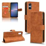 For Sony Xperia 5 V 2023 Skin Feel Magnetic Flip Leather Phone Case(Brown)