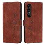 For Sony Xperia 1 VII Skin Feel Heart Embossed Leather Phone Case with Long Lanyard(Brown)