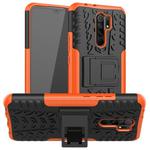 For Xiaomi Redmi 9 Tire Texture Shockproof TPU + PC Protective Case with Holder(Orange)