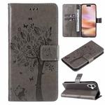 For iPhone 16 Plus Tree & Cat Embossed Pattern Flip Leather Phone Case(Grey)