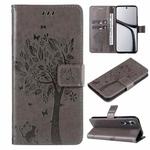 For Realme C65 4G Tree & Cat Embossed Pattern Flip Leather Phone Case(Grey)