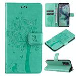 For Motorola Moto G35 Tree & Cat Embossed Pattern Flip Leather Phone Case(Green)