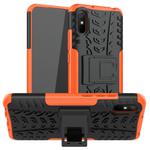 For Xiaomi Redmi 9A Tire Texture Shockproof TPU+PC Protective Case with Holder(Orange)