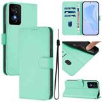 For TCL 50 SE Skin Feel Solid Color Leather Phone Case with Lanyard(Mint Green)