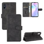 For Xiaomi Redmi 9A Solid Color Skin Feel Magnetic Buckle Horizontal Flip Calf Texture PU Leather Case with Holder & Card Slots & Wallet(Black)