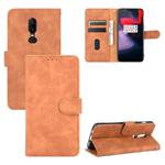 For OnePlus 6 Solid Color Skin Feel Magnetic Buckle Horizontal Flip Calf Texture PU Leather Case with Holder & Card Slots & Wallet(Brown)