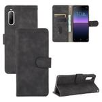 For Sony Xperia 10 II Solid Color Skin Feel Magnetic Buckle Horizontal Flip Calf Texture PU Leather Case with Holder & Card Slots & Wallet(Black)