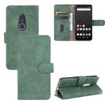 For Fujitsu Arrows Be4 (F-41A) Solid Color Skin Feel Magnetic Buckle Horizontal Flip Calf Texture PU Leather Case with Holder & Card Slots & Wallet(Green)