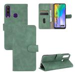 For Huawei Y6p Solid Color Skin Feel Magnetic Buckle Horizontal Flip Calf Texture PU Leather Case with Holder & Card Slots & Wallet(Green)