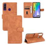 For Huawei Y6p Solid Color Skin Feel Magnetic Buckle Horizontal Flip Calf Texture PU Leather Case with Holder & Card Slots & Wallet(Brown)