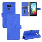 For LG K40S Solid Color Skin Feel Magnetic Buckle Horizontal Flip Calf Texture PU Leather Case with Holder & Card Slots & Wallet(Blue)