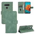 For LG K51 / Q51 Solid Color Skin Feel Magnetic Buckle Horizontal Flip Calf Texture PU Leather Case with Holder & Card Slots & Wallet(Green)