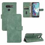 For LG Q70 Solid Color Skin Feel Magnetic Buckle Horizontal Flip Calf Texture PU Leather Case with Holder & Card Slots & Wallet(Green)