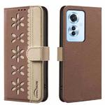 For OPPO Reno11 F Splicing Color Hollow Flower Pattern RFID Leather Phone Case(Brown)