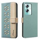 For OPPO A79 5G Splicing Color Hollow Flower Pattern RFID Leather Phone Case(Green)
