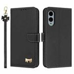 For Fujitsu Arrows We2 F-52E Metal Bow Leather Phone Case with Hand Strap(Black)