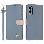 For Fujitsu Arrows We2 F-52E Metal Bow Leather Phone Case with Hand Strap(Light Blue)