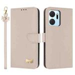 For Honor X7a 4G Metal Bow Leather Phone Case with Hand Strap(Apricot)