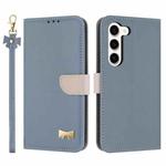 For Samsung Galaxy S23 5G Metal Bow Leather Phone Case with Hand Strap(Light Blue)