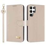 For Samsung Galaxy S23 Ultra 5G Metal Bow Leather Phone Case with Hand Strap(Apricot)